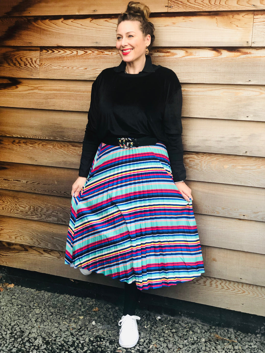 Put those jeans away, the pleated skirt has arrived!