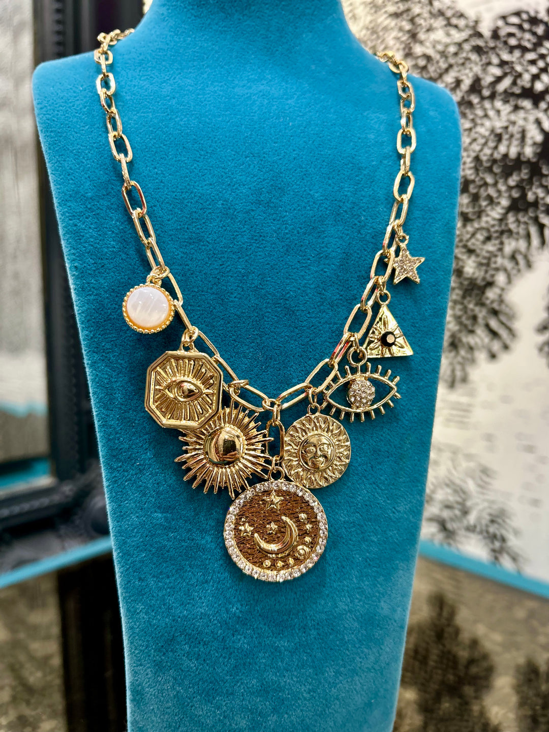 Delicate Charms Necklace in Gold Tone