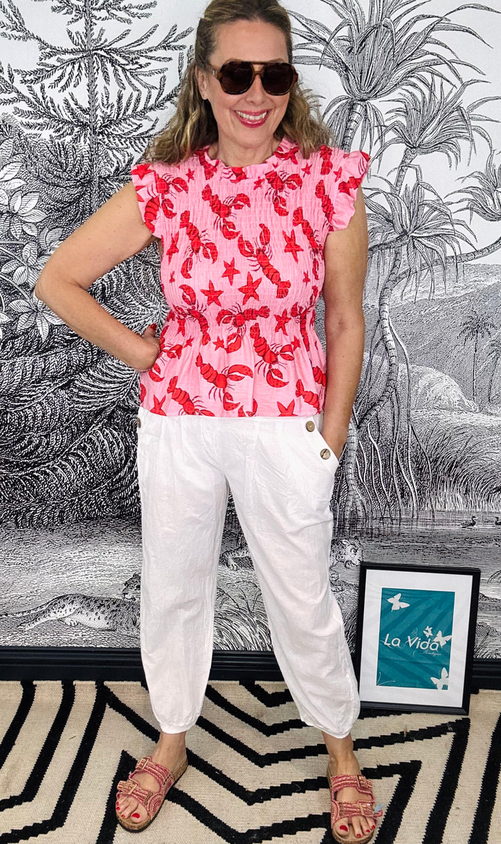 The Lobster Smocked Peplum Top
