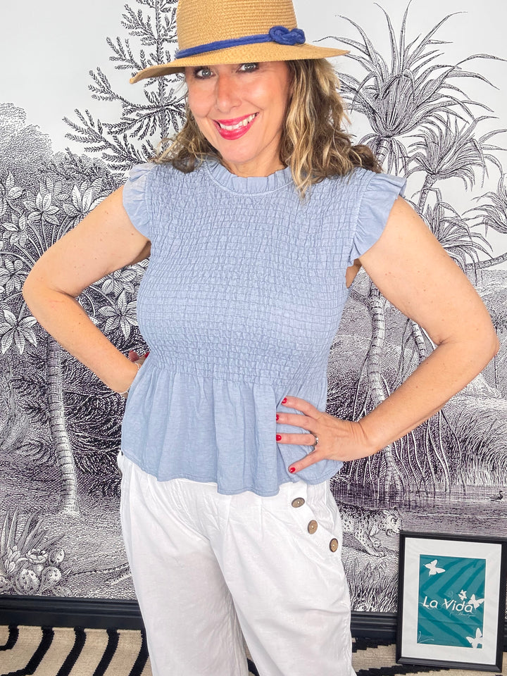 Smocked Peplum Top