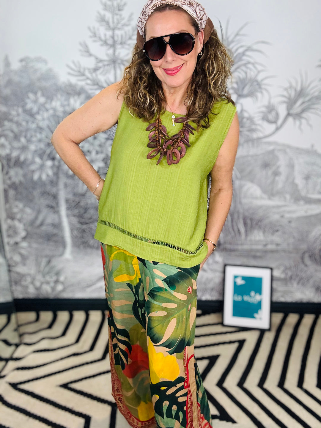 Tobago Textured Sleeveless Top with Cutout Hem