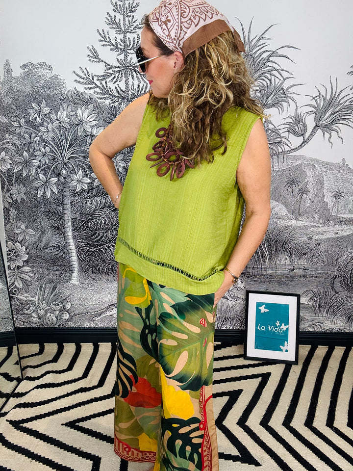 Tobago Textured Sleeveless Top with Cutout Hem