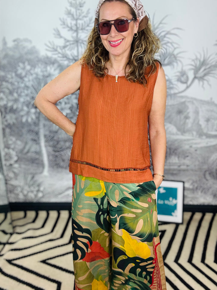 Tobago Textured Sleeveless Top with Cutout Hem