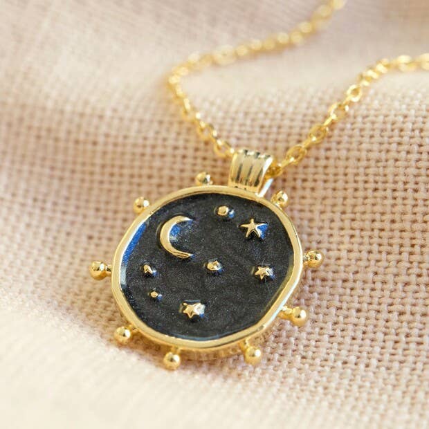 Day and Night Reversable enamel necklace in navy and gold